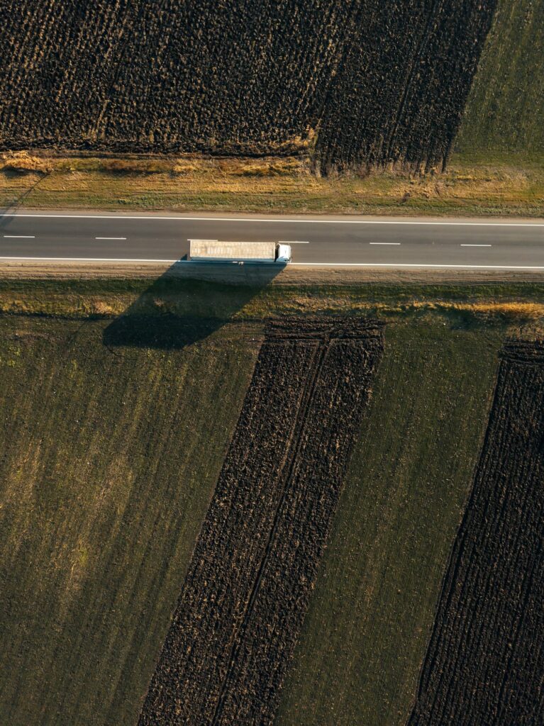 Aerial view of freight transportation truck on the road