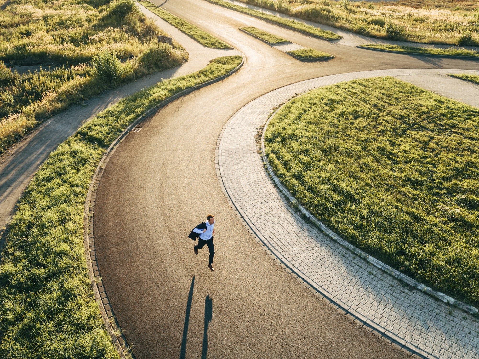Businessman running in roundabout